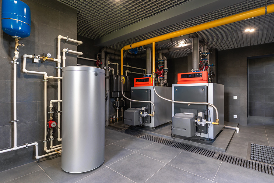 Two large boilers in a commercial heating system