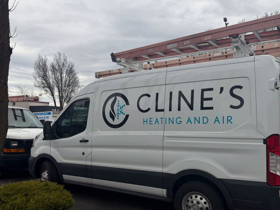 installing a new air conditioning system - Cline's Heating and Air truck